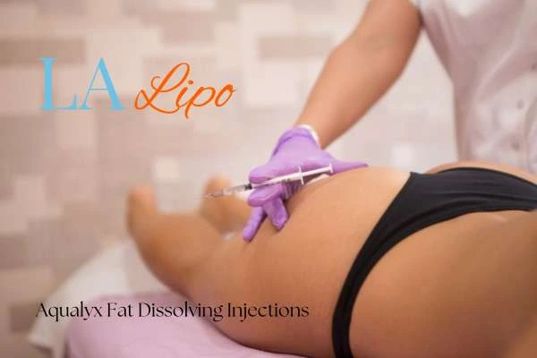 Woman having fat dissolving injections Hungerford on thighs