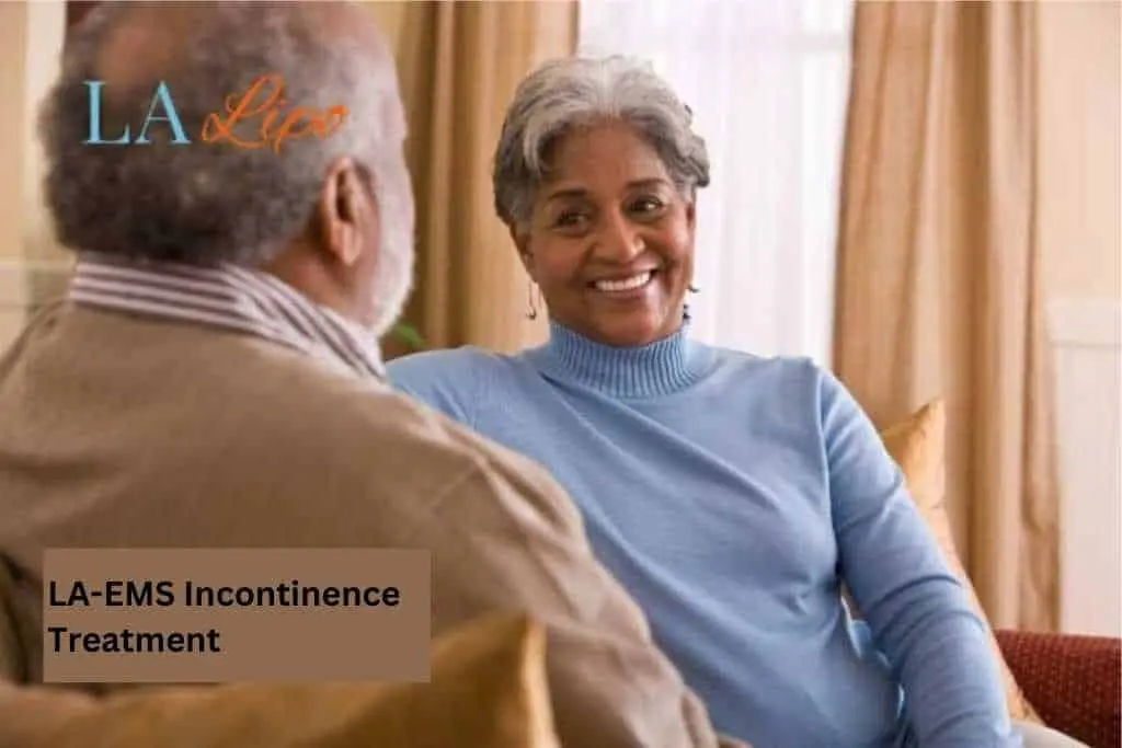 Couple sat smiling at each other - LA-EMS treatment Hungerford