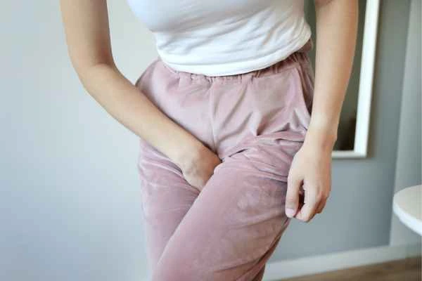 older woman running to the toilet because of urinary incontinence Hungerford